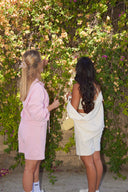 Half-zip stand-collar sweatshirt and Bermuda shorts, back view — DWEGO