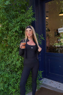 Women's 3-piece zip-jacket activewear set, front view on model — DWEGO