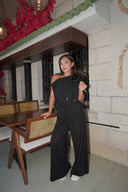 Women's relaxed drape two-piece set, draped one-shoulder top and wide-leg pants, front view — DWEGO
