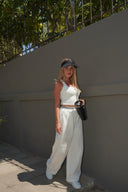 Women's layered wide-leg pants, front view on model — DWEGO