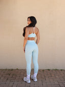 Crisscross-back bra and leggings co-ord, detail view — DWEGO