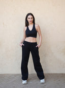 Two-tone sports bra with wide-leg pants — DWEGO