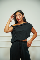 Draped asymmetric one-shoulder top detail — DWEGO