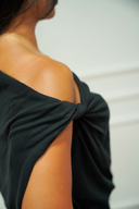Women's relaxed drape two-piece set, side view — DWEGO