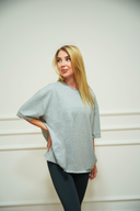 Women's featherlight oversized tee, back view — DWEGO