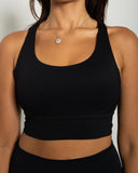 Racerback training top, back view — DWEGO